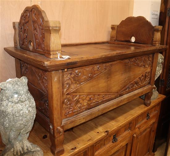 A small Eastern carved hardwood bed with slatted top, L.115cm